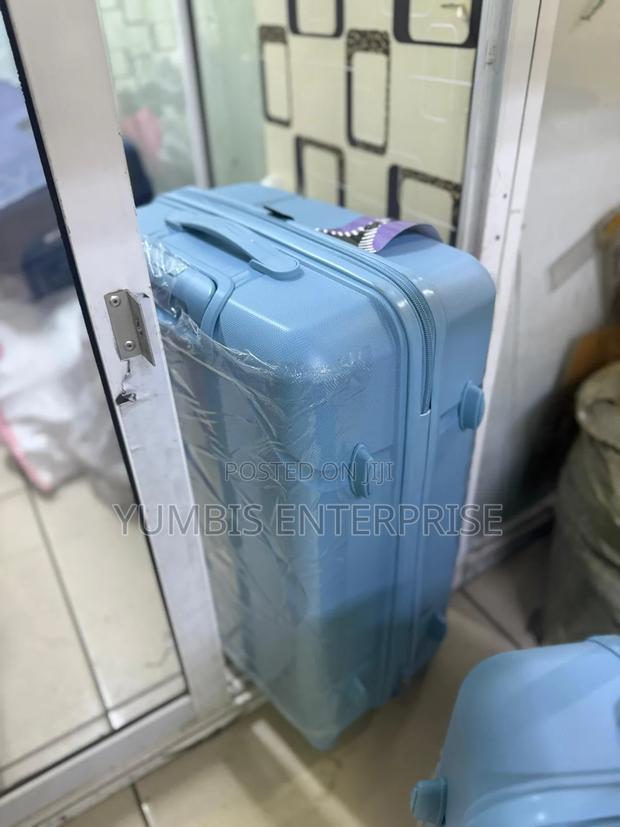 Sky Blue 69cm Height Rubber Suitcase at 3500 - thumbnail 2