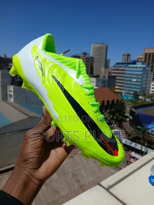 New Low Budget Luminous Green Phantom Football Boots.