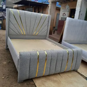 Tufted Modern Bed With Gold