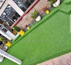 All Green Artificial Grass Carpet at the House Backyard