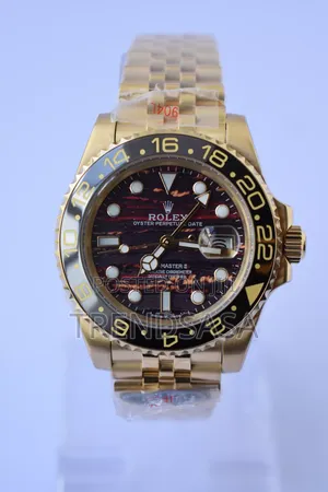Rolex G M T Tiger Iron Dial Yellow Gold Jubilee Bracelet