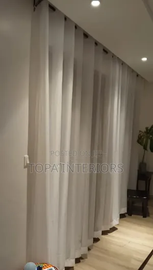 Custom Made Sheer Curtains to Allow Light During the Day