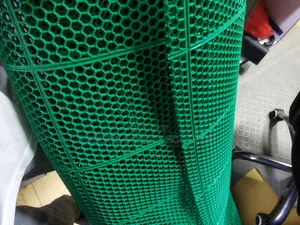Anti-Slip PVC Design to Trap Dirt and Allow for Drainage