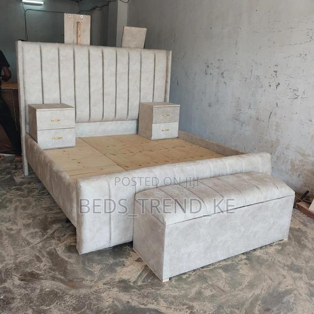 6 by 6 Lined Bed With Side Drawers and an Ottoman