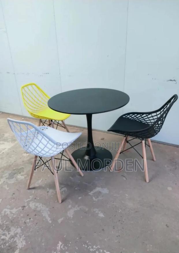 Round Dining Table With Mesh Dining Chairs