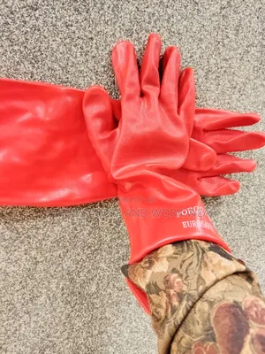 Red Pvc Gloves For Marine And Fish Processing Jobs.