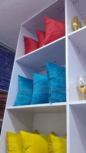 Red, Blue, Yellow Pillows With Bed Runner