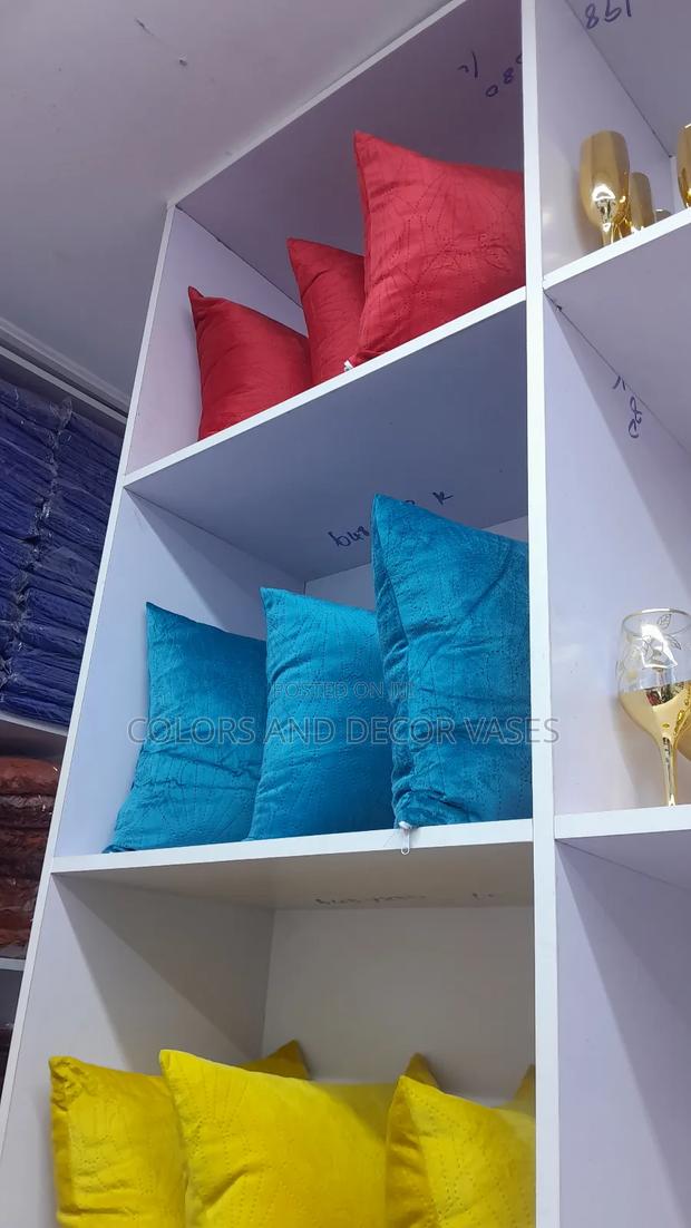 Red, Blue, Yellow Pillows With Bed Runner