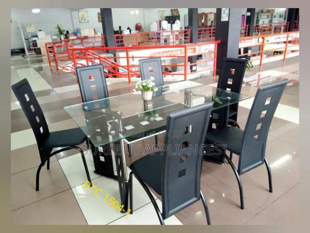 Executive 6 Sitter Glass Dinning Table With Leather Seat - main view