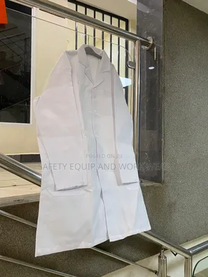 White Protective Coats For Food Industry Workers.