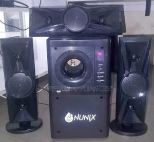 Nunix 3.1 Mini Home Theater System Nu-A60 and a Remote