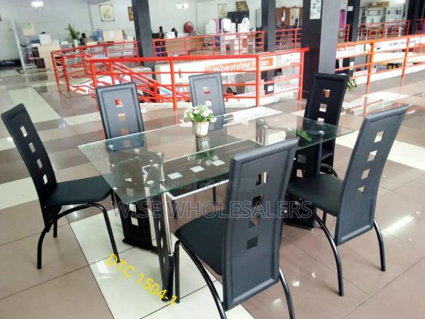 Executive 6 Sitter Glass Dinning Table  With Leather Seats
