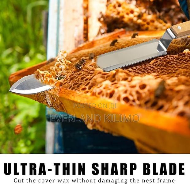 Stainless Steel Serrated Uncapping Knife - main view