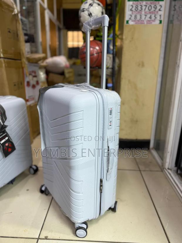 Small Light Grey Rubber Unbreakable Suitcase 56cm Height - thumbnail 2