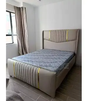 5 by 6 Tufted Bed