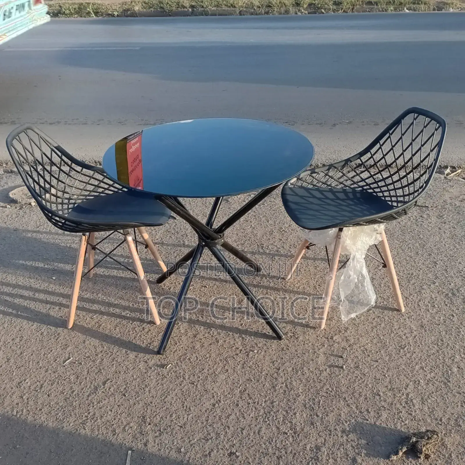 White Round Outdoor Table and Chairs
