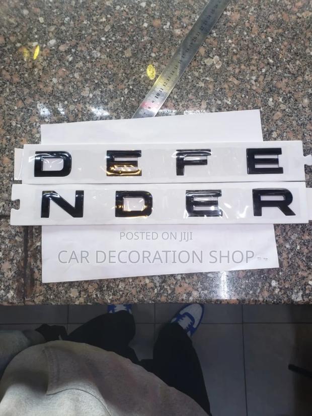 Black Defender Letter Decal Badge - main view