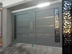 Sliding Gate With a Touch of Stainless Steel and CNC