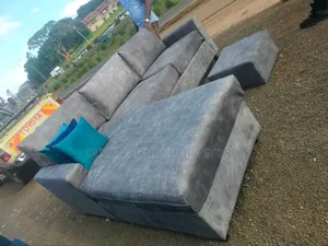Grey L Seat And A Table