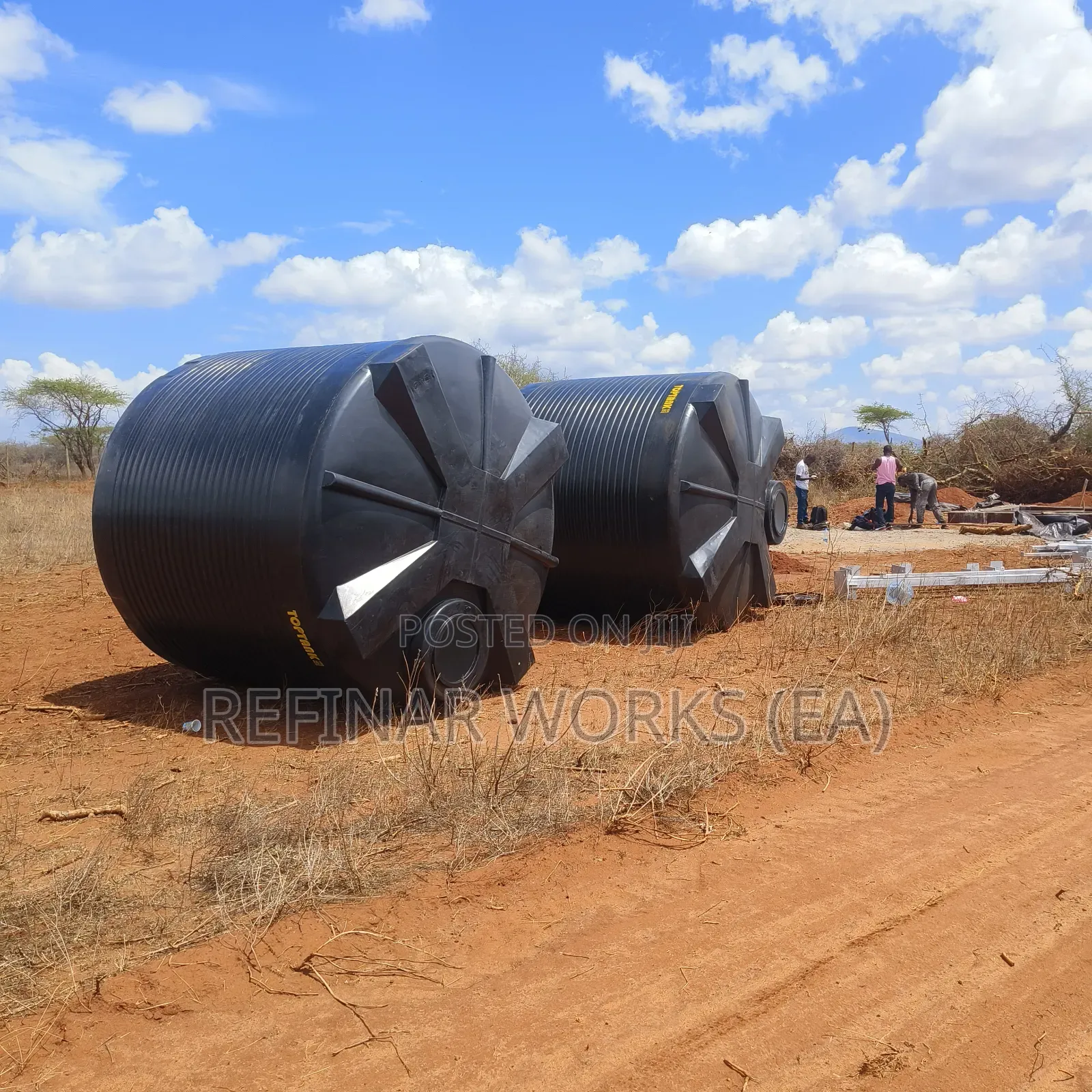 Heavy-Duty Water Towers With Solar Structures and Plumbing