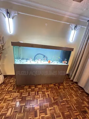 Stylish Aquarium With Wood-Finish Cabinet
