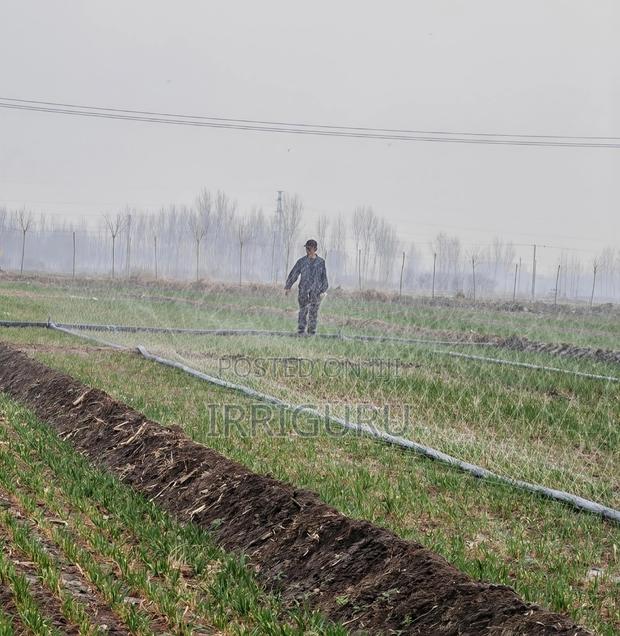 Irrigation Rainwater Pipe in Wheat Field - main view