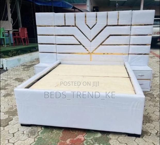 5 by 6 Board Bed With 2 Tall Side Drawers.