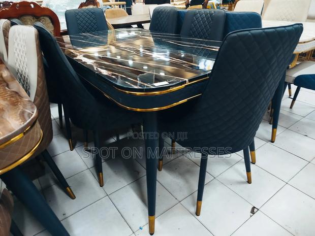 Dining Set - Golden Marble Top Table + 6 Leather Chairs.