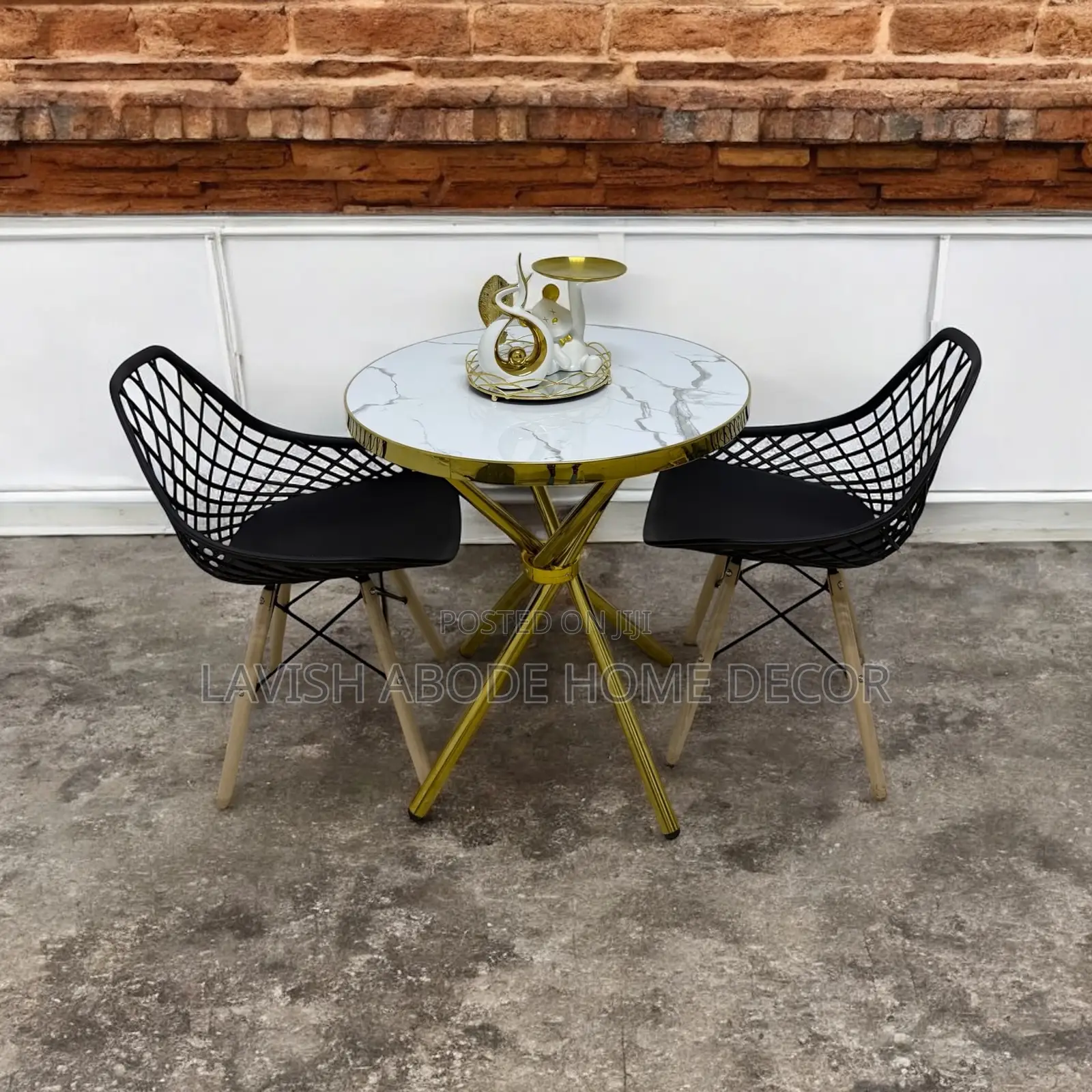 Gold Marble Table With 2 Mesh Eames Chairs