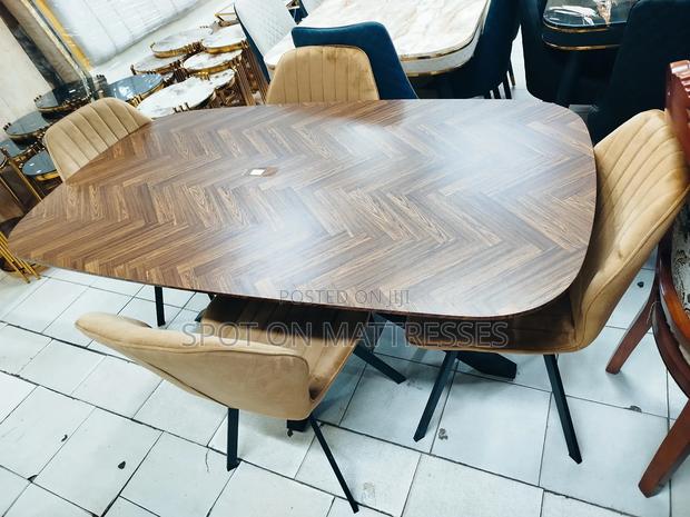Stylish Dining Set - 4 Suede Chairs and Wooden Top Table.