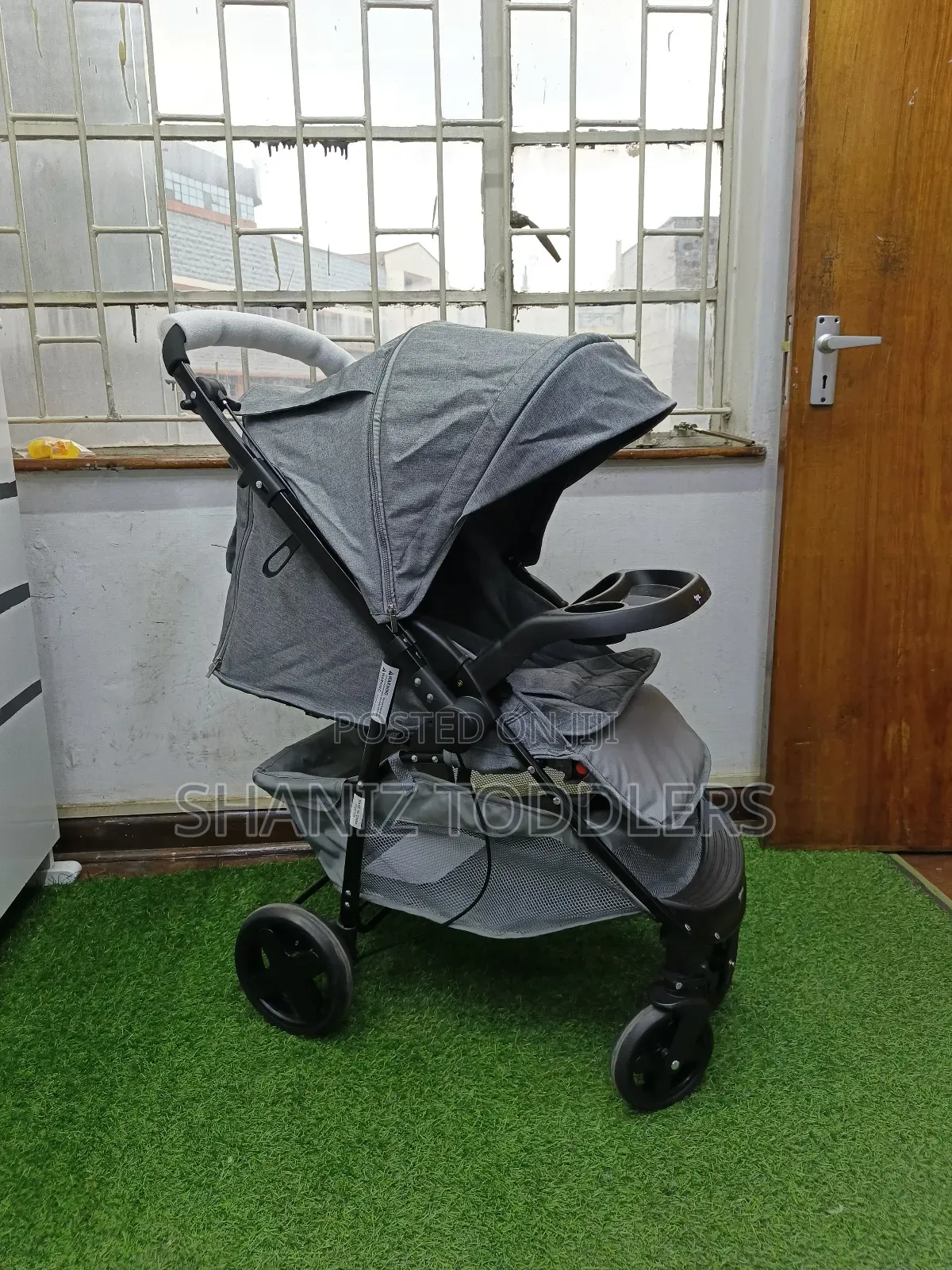 Grey Baby Stroller / Pram