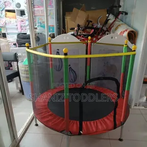Children Jumping Trampoline