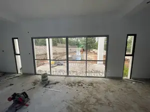Brown Aluminium Sliding Windows and Doors (Watamu Project)
