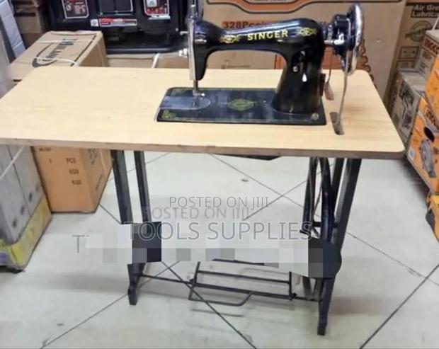 Singer Sewing Machine With Stand