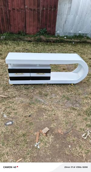 White Designer Curve Tv Stand With Led Beauty