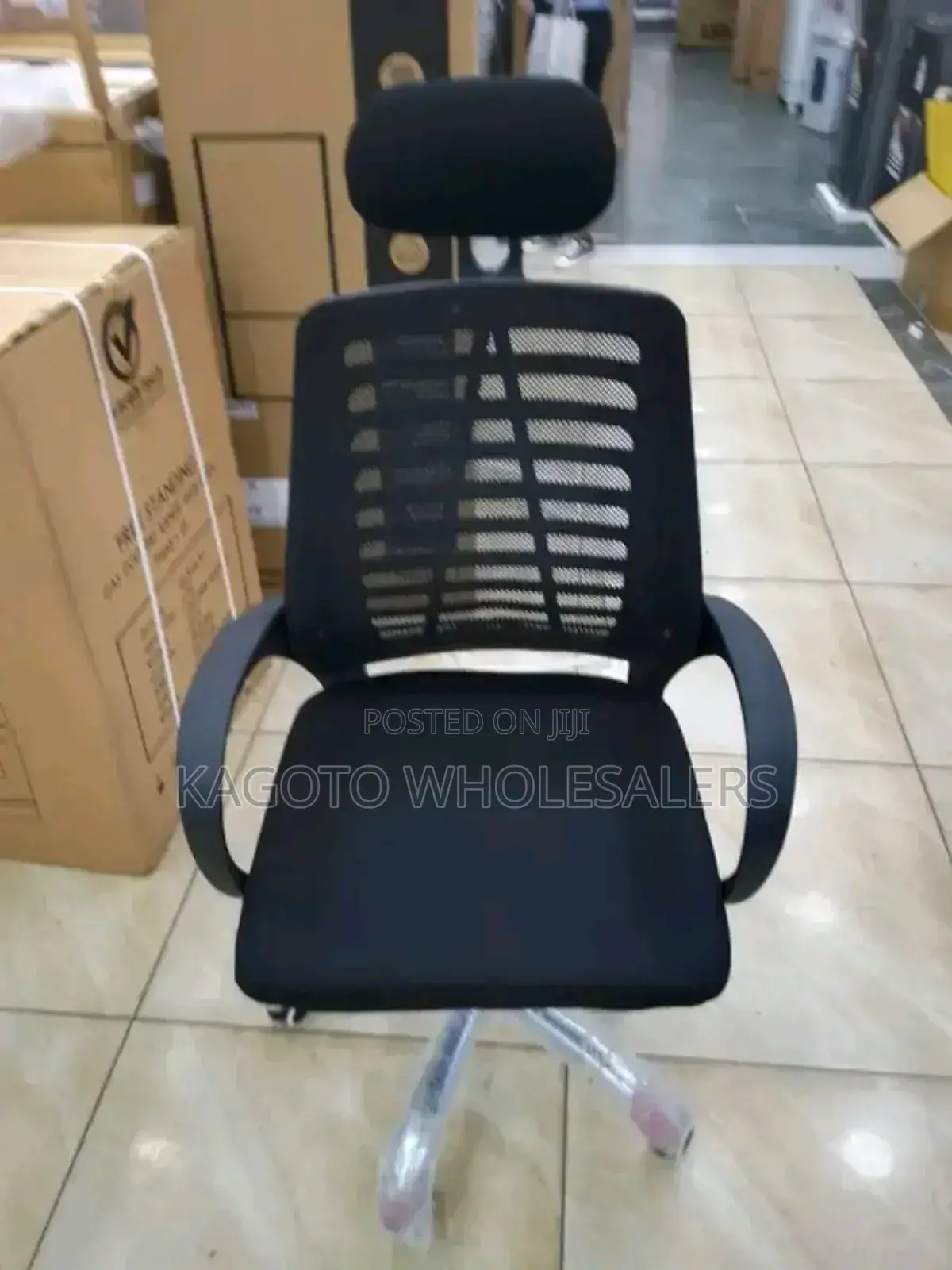 Black Rotating Office Chair With Headrest