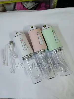Portable Oral Care Irrigator With 4 Nozzles