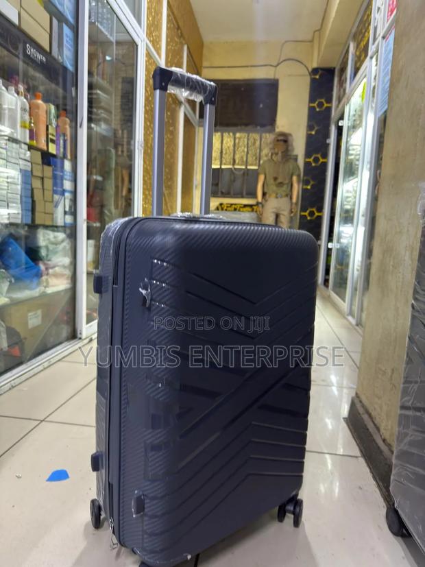 Dark Grey Medium 1 Piece Rubber Suitcase in 66cm Height - main view