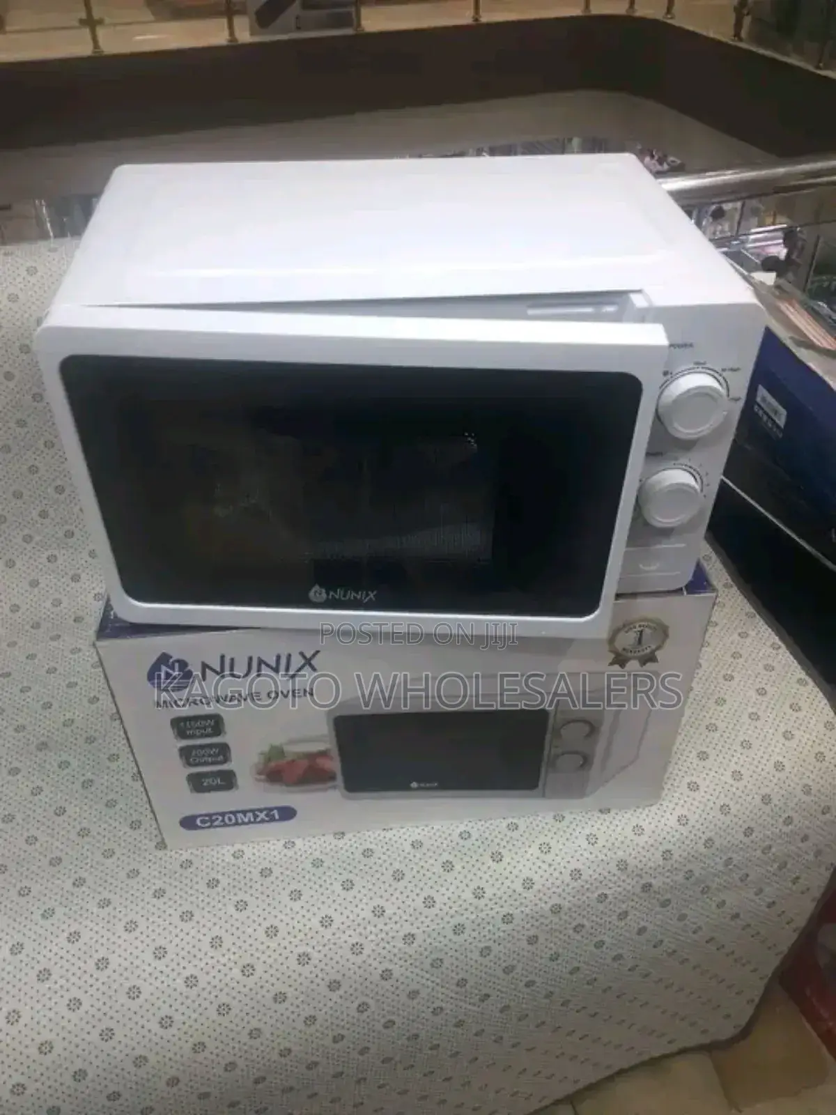 White Nunix Microwave Oven With Remote Control