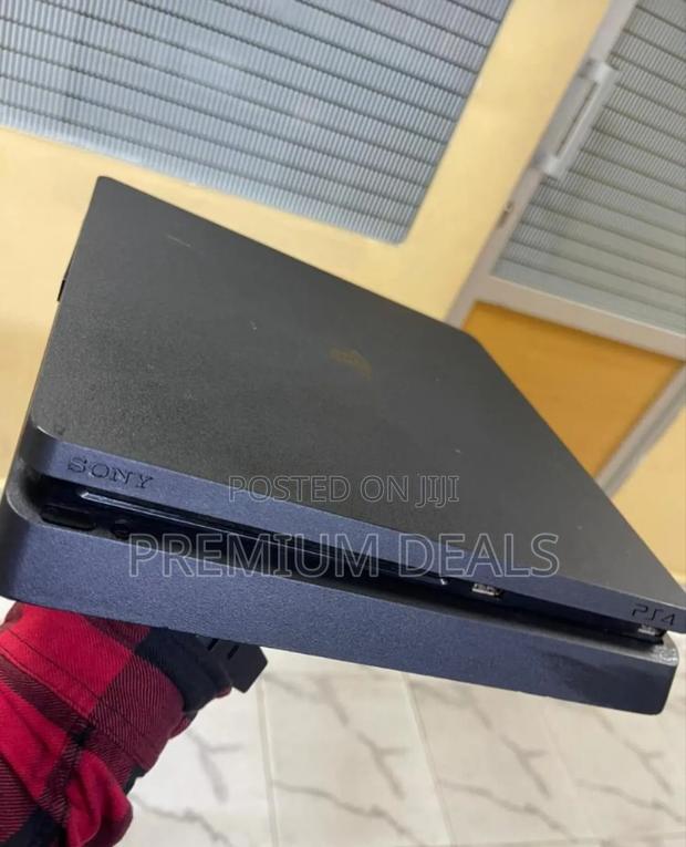 Warranted Ps4 Slim With Games.