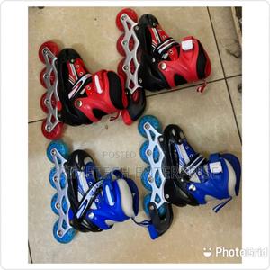 Skating Shoe With Guard and Helmet - main view