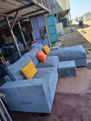 Elegant Light Blue 6 Seater L Seat With a Puff