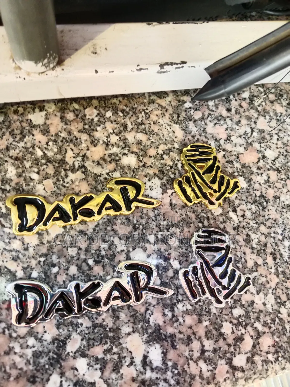 Dakar Metallic Badge in Gold or Silver (Each
