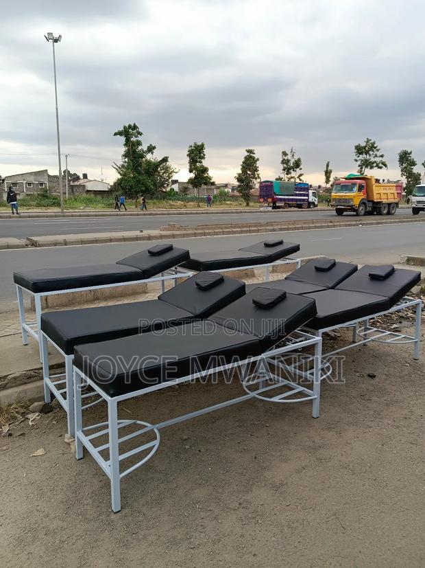 Massage Bed, White Frame, Black Mattress - main view