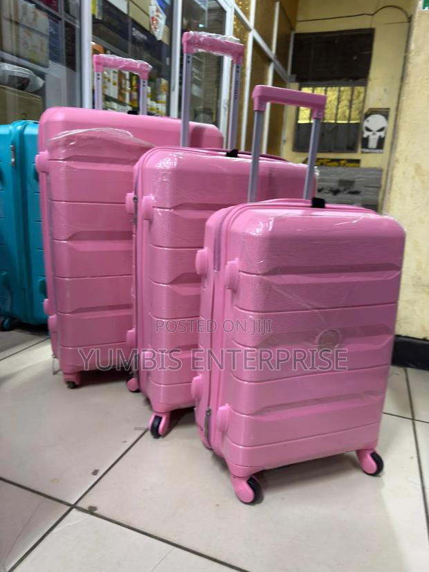 Baby Pink Rubber 3 in 1 Suitcases at 8500 KSH Set Luggage