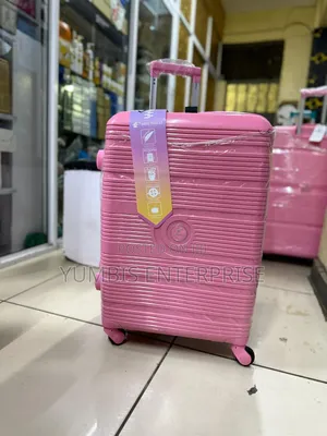 Pink Rubber Medium Suitcase 20- 22kgs at 3000