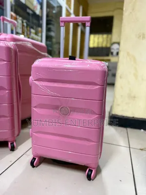 Pink Small Size Rubber Carryon Suitcase at 2000