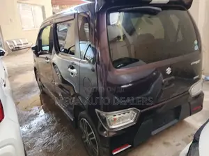 Suzuki T 2018 Brown