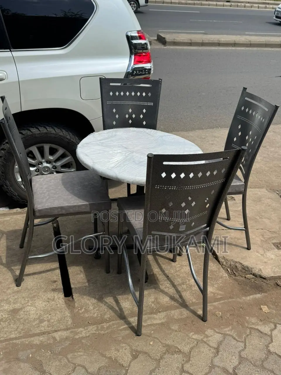 Restaurant And Bar Silver Coated Chairs And Marble Table
