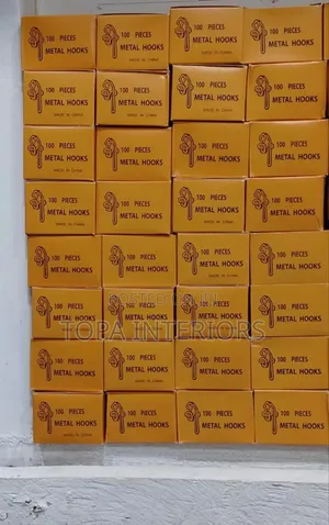 A Box of Metal Curtain Hooks With One Hundred Pieces